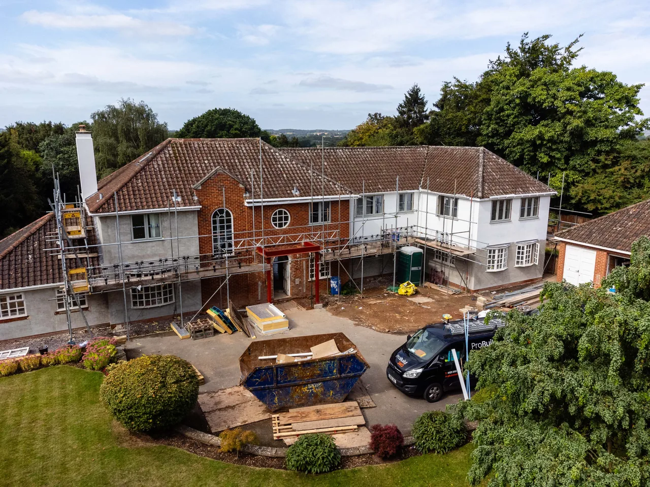 Aerial view of a large detached property where climate systems were installed