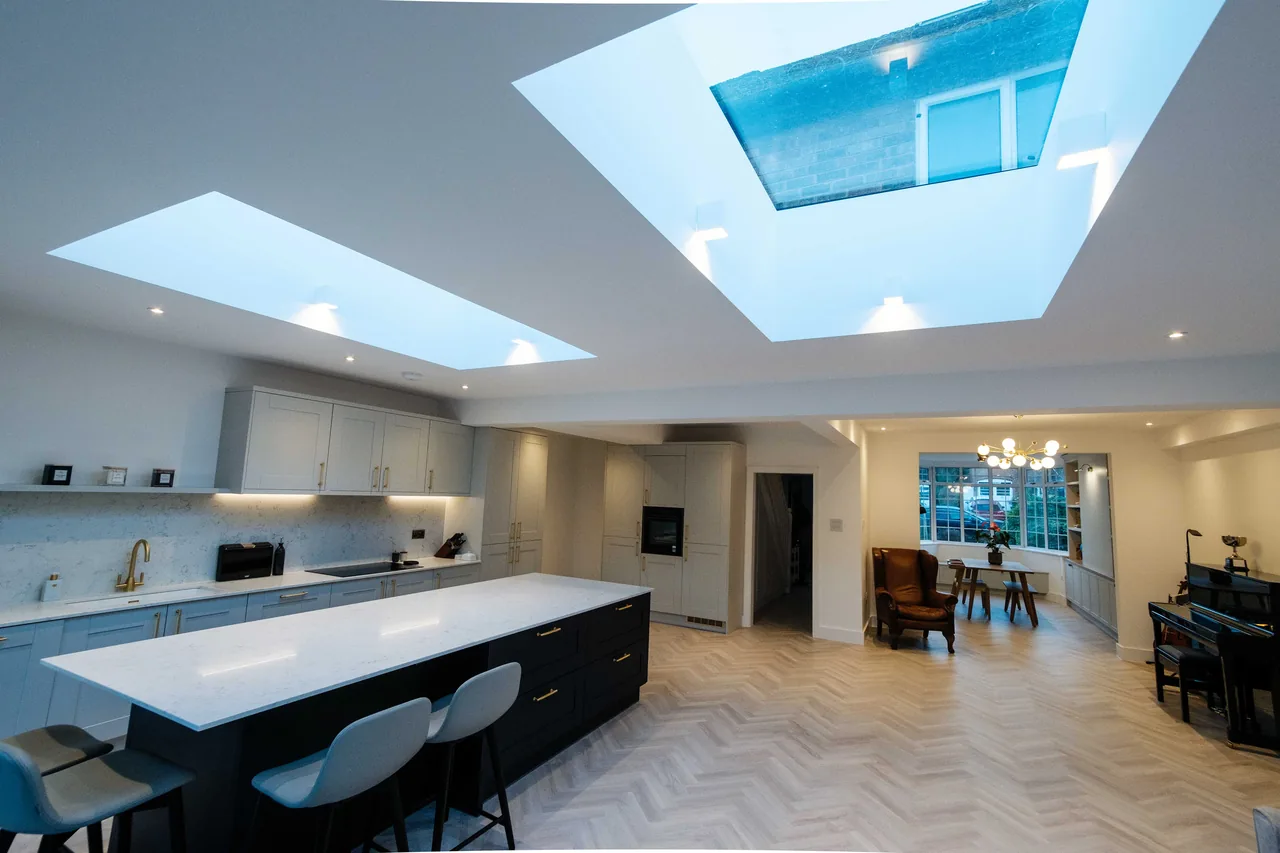 Concealed cove lighting washing a ceiling in a finished living space